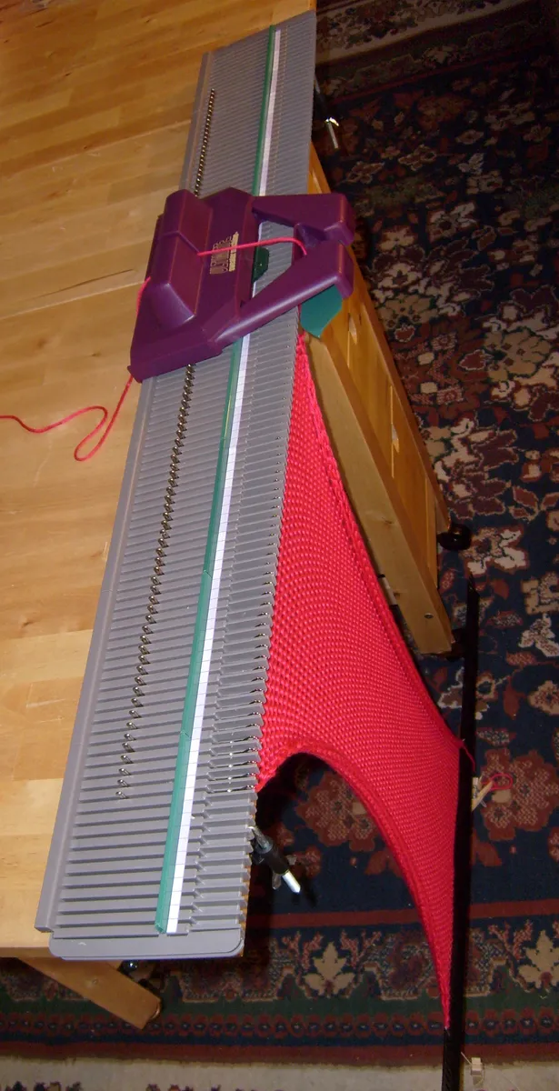 A domestic knitting-machine reference, not the specific equipment used by KAMA.