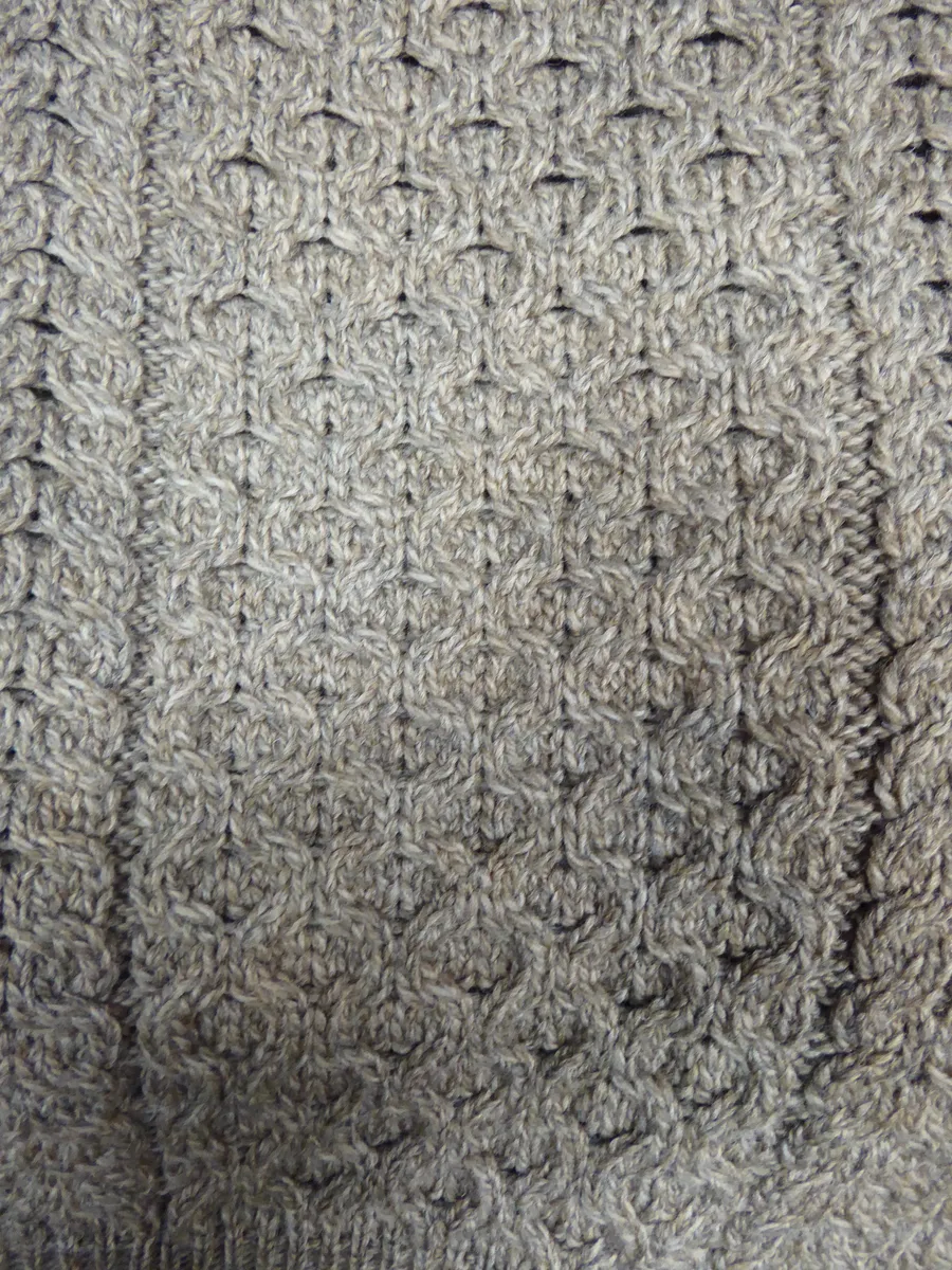 Honeycomb texture for structural comparison, not a KAMA garment.